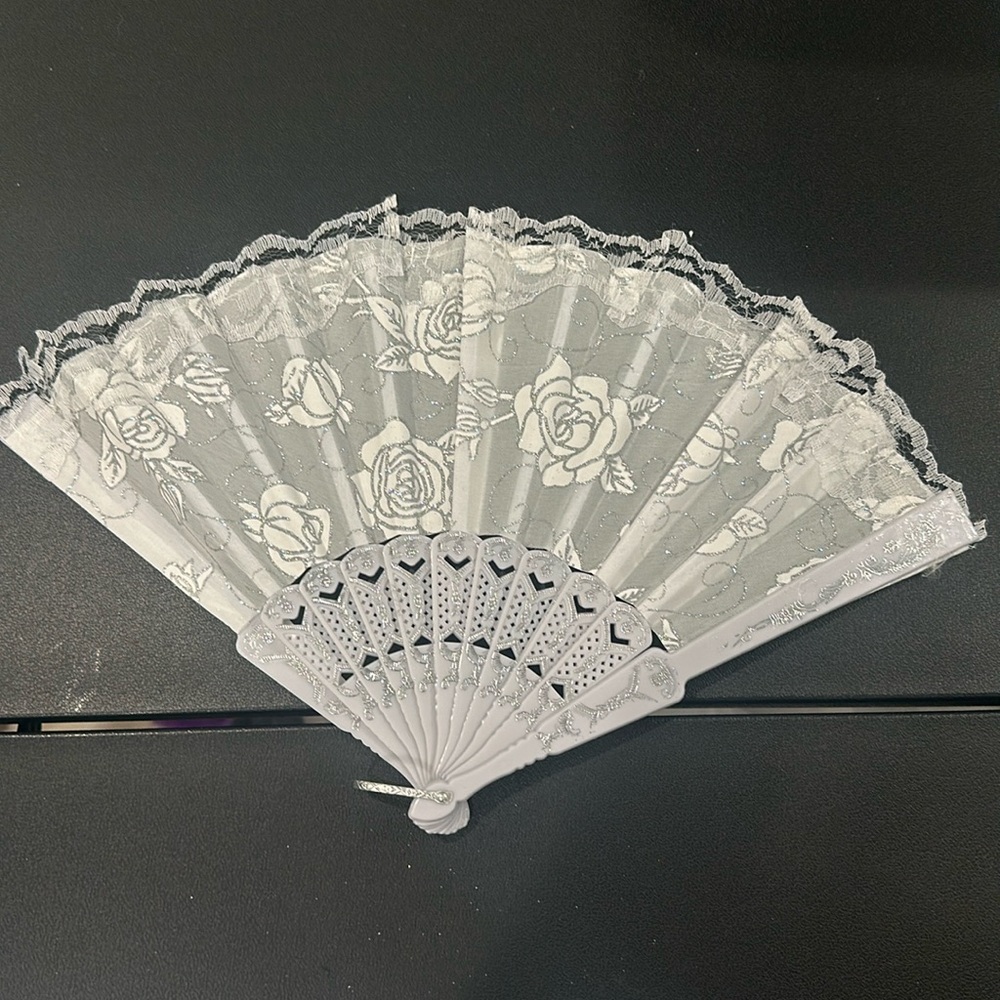 22 plastic white fans never opened